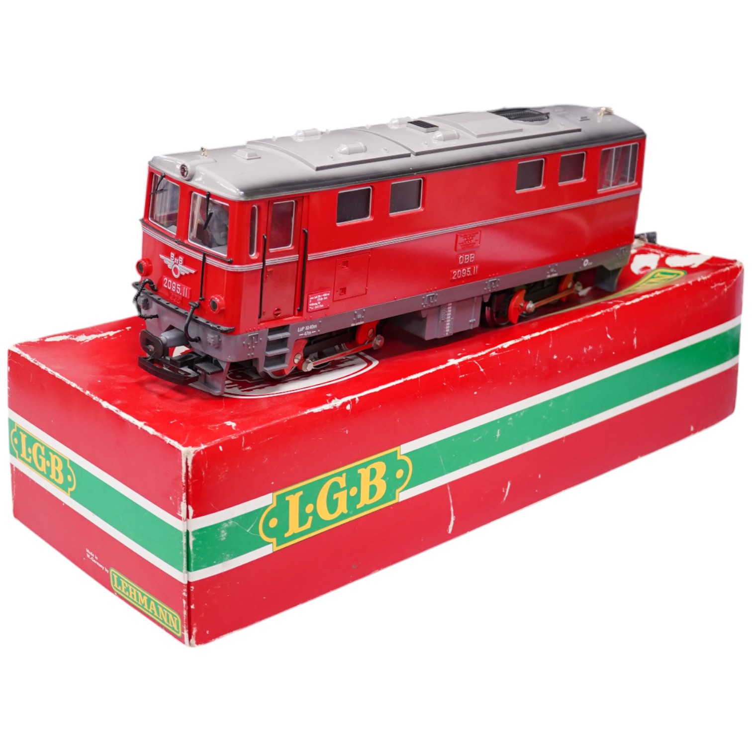 A boxed Lehmann LGB G scale railway OBB Austrian outline Bo-Bo diesel locomotive, 2095.11. Condition - fair, some wear and minor damage, and damage to the box.